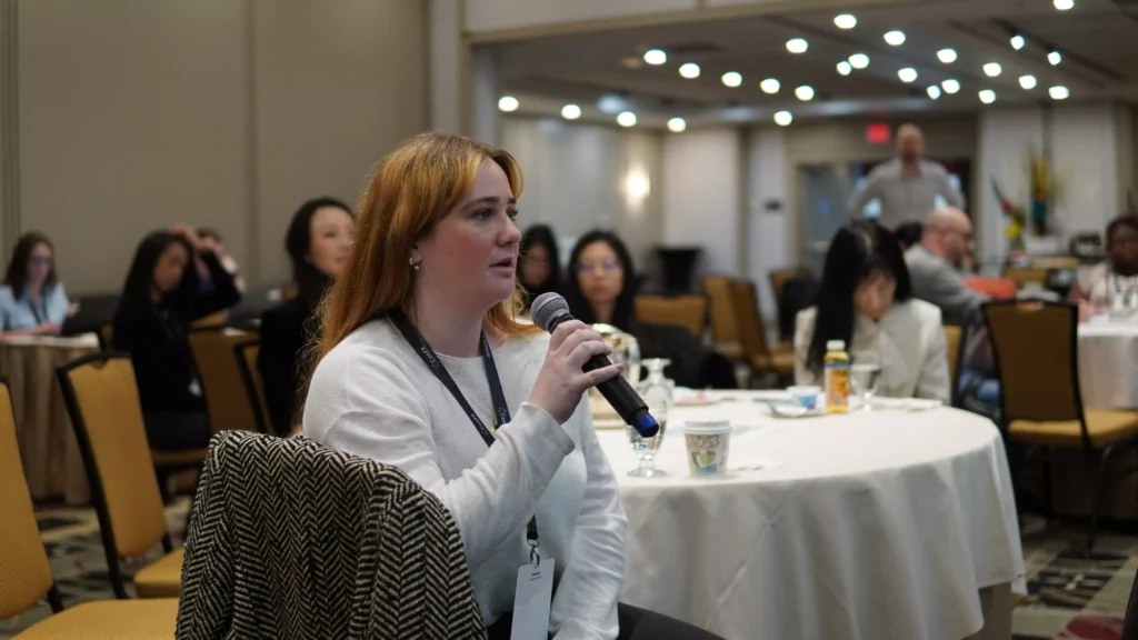 An audience member asking a question at a previous BIAAS edition