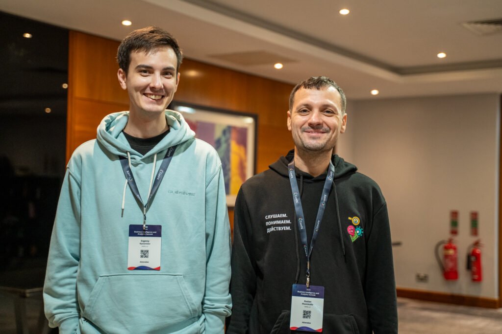 Two delegates smiling for the camera