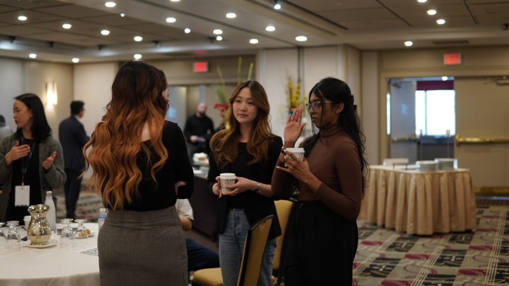 Delegates talking over coffee between sessions