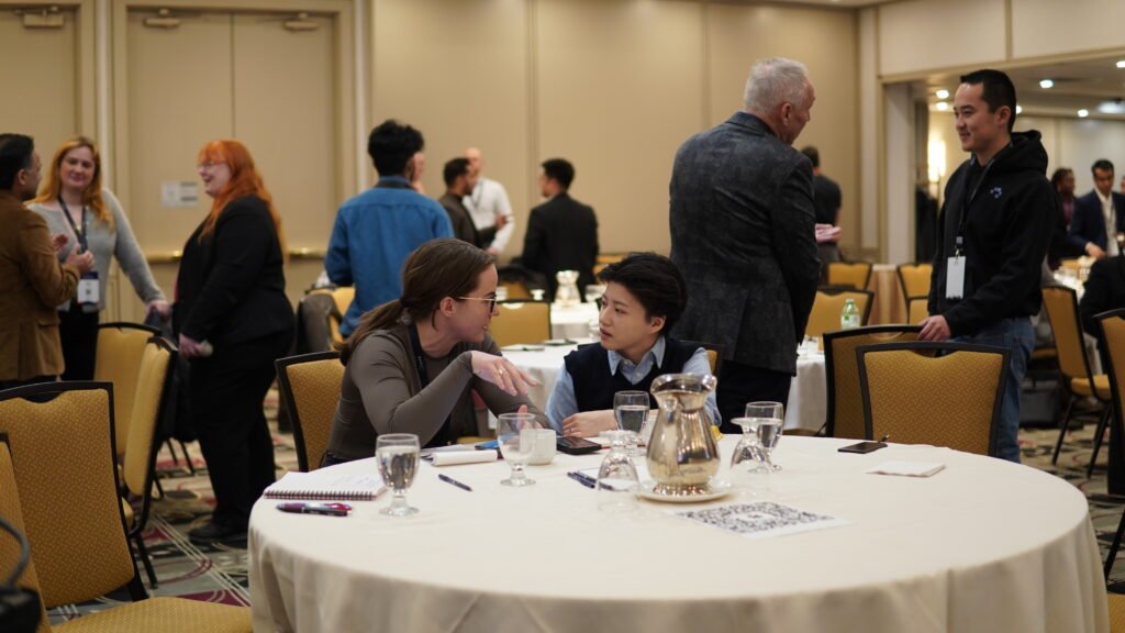 Delegates networking around the tables